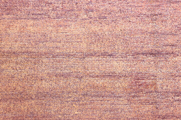 A huge solid brick wall with no windows. Old, cracked masonry, coated with deposits and grime.