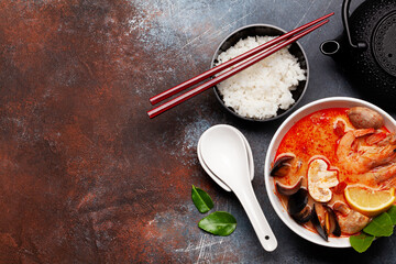 Traditional Thai soup Tom Yum and rice bowl