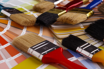 Close-up on color palette guide for printing and painting. Concept - choice of colors for design.