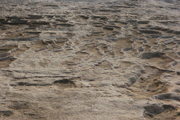 Detail of limestone travertine at Pamukkale, Turkey. Natural travertine stone texture and surface background.