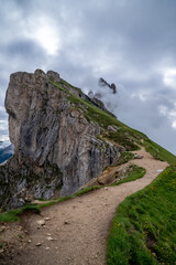 A gravel road to the peaks of the beautiful mountains of seceda.