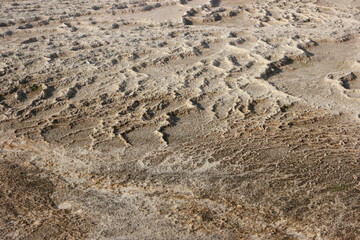 Deposits on the surface at Pamukkale travertines. Natural minerals texture. Geological background.
