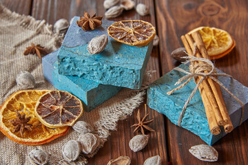 Scented, bright blue organic handmade soap and scented spices.