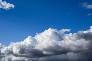 Naklejka na ściany i meble Photo of the sky with clouds on a sunny day