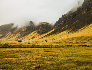 South part of Iceland nearby Eyjafjallaj&ouml;kull volcano with peaks in clouds in april