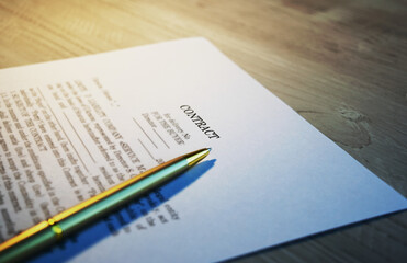 Business contract and pen on the table. Business and finance concept. Selective focus.