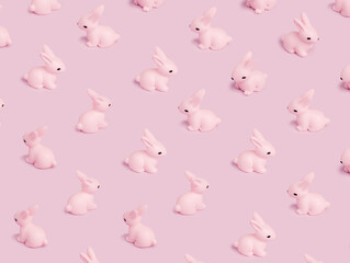 Easter pattern with pink bunny on a pastel pink background. Creative minimal holiday concept. Flat lay, top view.