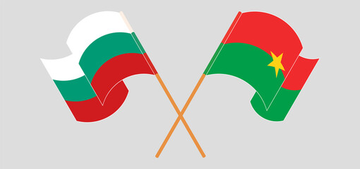 Crossed and waving flags of Bulgaria and Burkina Faso