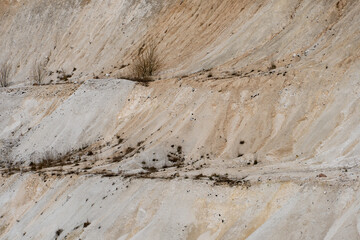Large sand pit and lake. A flooded old abandoned quarry complex. Extraction of sand and stone for industrial applications.