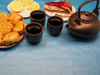 tea set with cake and pies