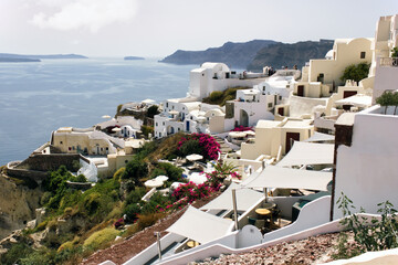 Santorini, Greece : Cyclades architecture hotels houses over the caldera in Oia santorini greek islands against mediterranean sea view with mountains