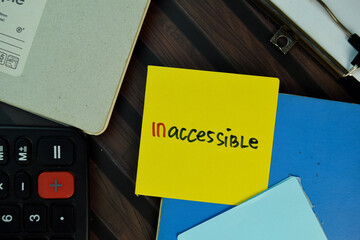 Inaccessible write on sticky notes isolated on Wooden Table.