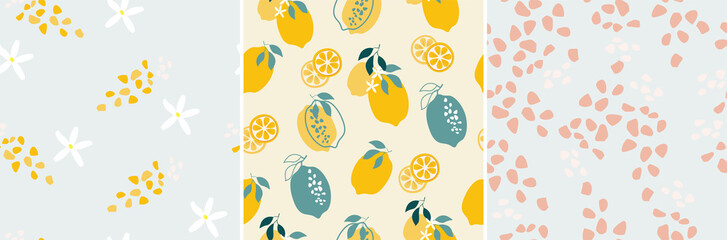 A set of artistic seamless patterns with abstract flowers, shapes, leaves, lemons in yellow and blue. Vector illustration.