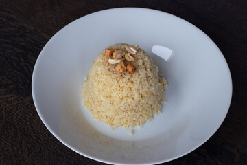 Bulgur tower on a white plate