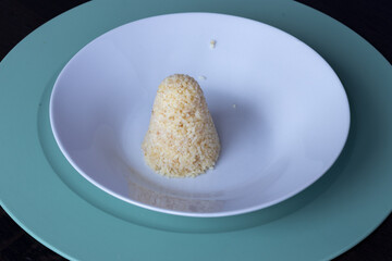 Bulgur tower on a white plate