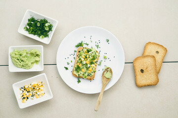 Avocado toasts on bread. Vegetarian food. Plant-based diet. Clean eating. Top view.