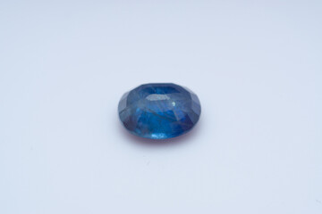 Natural stone sapphire on a white background