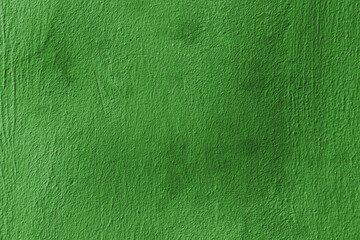 Green background. Texture of a green concrete wall of a building in Paris.