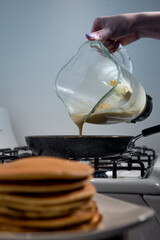 Woman cooking some delicious Hotcake