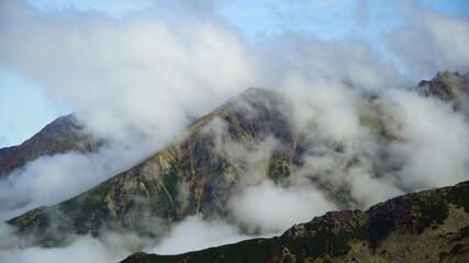 Koscielec from Kasprowy Wierch. Mountain covered in the clouds. High quality photo