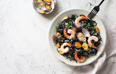 Squid ink black pasta with seafood- mussels, shrimps and clam