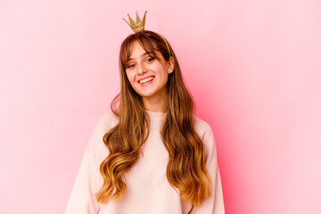 Young caucasian woman with princess crown isolated happy, smiling and cheerful. © Asier