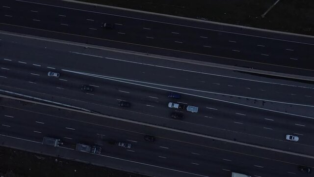 2.7K aerial flight rotating above 16 lanes of 401 traffic near Toronto