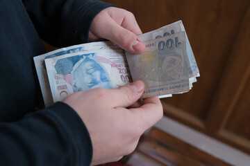 Worker hands counting money, turkish lira, man hands