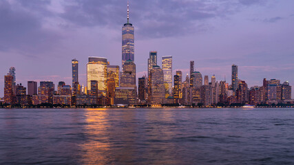 New York city Manhattan skyline cityscape at sunset from New Jersey. 