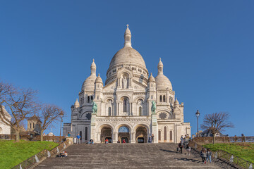 Fototapeta premium Paris, France - 02 26 2021: Montmartre district. View of the Basilica of sacred heart