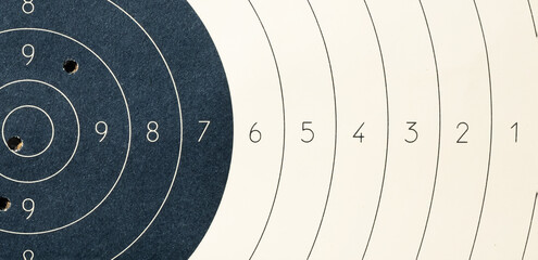 Target with numbers for shooting at a shooting range. A round target with a marked bull's-eye for...