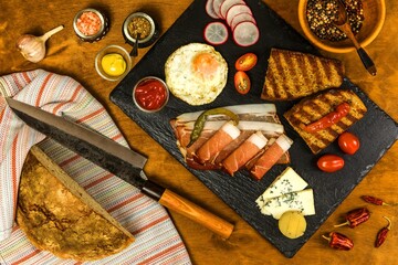 Homemade toasted bread with ham egg and cheese. Grilled bread. Fast food.