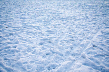 Snow landscape covered with foot prints in Berlin Germany 2021