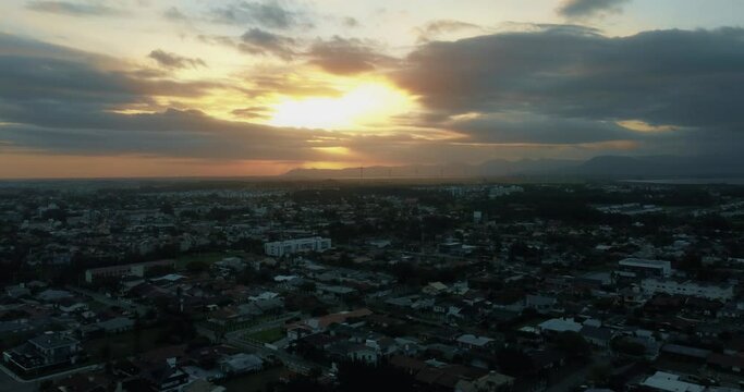 Cap&atilde;o da canoa beach at sunset summer bildings houses drone eolic