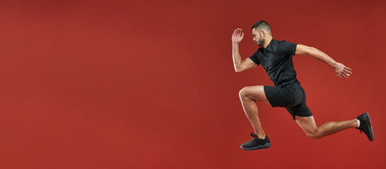 Website header of Adult strong athlete man in action in the indoors