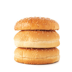 Stacked hamburger bun with salad seeds isolated on white background