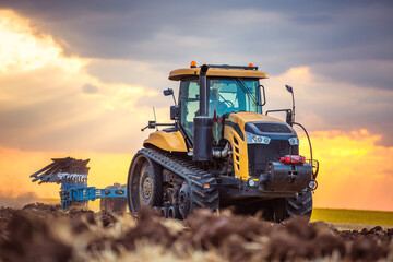 Tractor plowing the fields