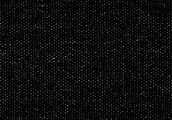 Small uneven spots and particles of debris. Abstract vector texture.  Distressed uneven background. Grunge texture overlay with fine grains isolated on white background. Vector illustration. EPS10.