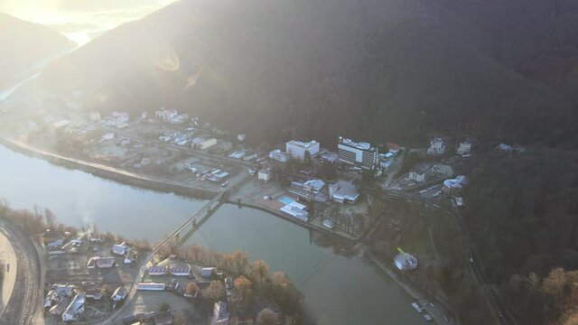 Aerial drone Calimanesti Caciulata Hotels in Valcea.  Cozia Monastery near Olt River bridge environment in mountain Olt Valley beautiful gorge river in Romania, defile carved valley near national park