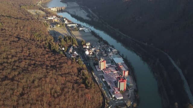 Aerial drone Calimanesti Caciulata Hotels in Valcea.  Cozia Monastery near Olt River bridge environment in mountain Olt Valley beautiful gorge river in Romania, defile carved valley near national park