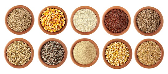 Set cereals, oats grain peel, corn grains, quinoa seeds, red wild rice, spelt, unpeeled oat, tri-color quinoa seeds, amaranth, corn for popcorn, millet  in clay pot, isolated on white background   