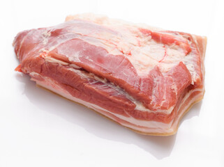 raw meat piece on white background, pork meat and lard
