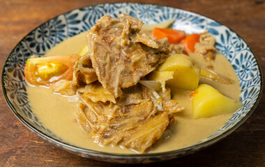 Malaysian dish salted fish curry or locally known as Gulai Ikan Masin. 