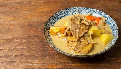 Malaysian dish salted fish curry or locally known as Gulai Ikan Masin. 