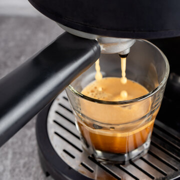 Process Of Preparing Espresso With Coffe Machine.