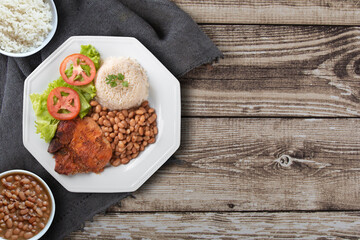 Traditional dish of Brazilian food beans with rice top view