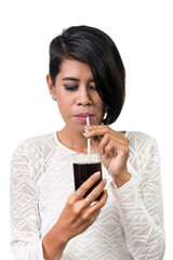 Beautiful asian woman drinking cola. Studio shot