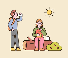 A couple is backpacking. They are sitting on a log and drinking water and resting. flat design style minimal vector illustration.