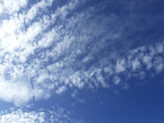 Beautiful white clouds, blue sky, the azure stratosphere, and spindrift, with texture background in nature for wallpaper pattern concept.