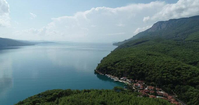 Aerial view of Akyaka town and High mountains next to the sea Mugla Turkey